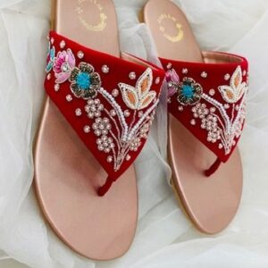 red flat sandal with embroidary