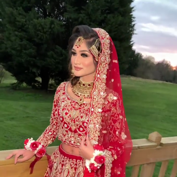 hot pink color velvet lehenga with long trail