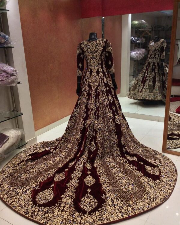 maroon velvet bridal gown with long trail