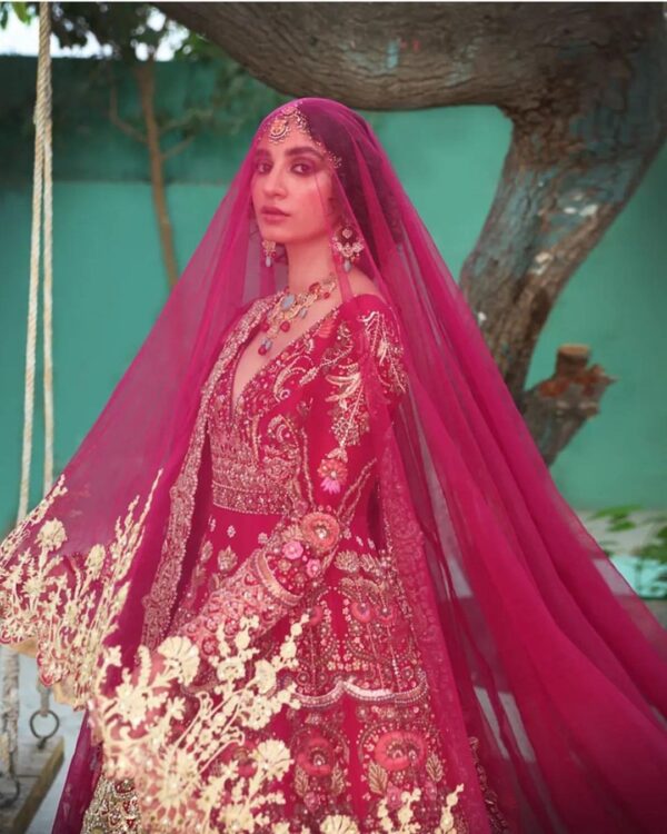 rani pink bridal gown with long trail