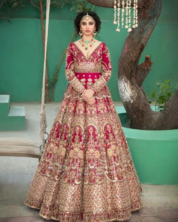 rani pink bridal gown with golden embroidery