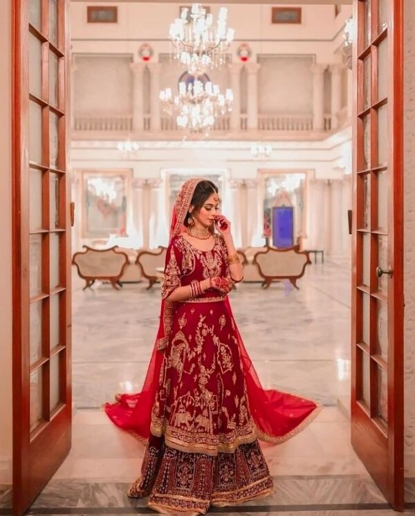 red and golden bridal lehenga with embellishment
