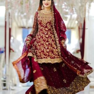 maroon bridal lehenga with golden embroidery