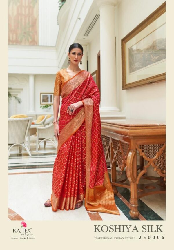 red and orange printed saree