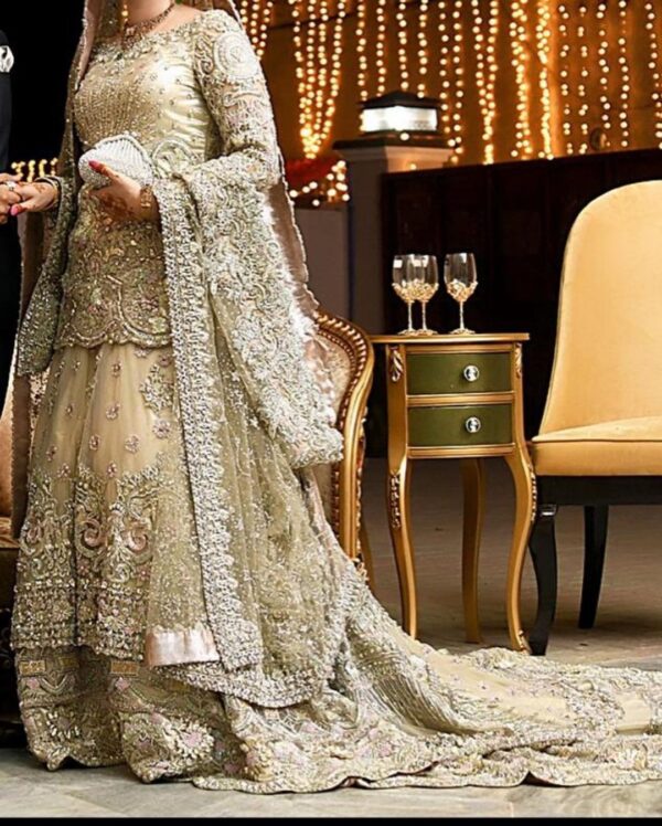ivory bridal lehenga with long trail