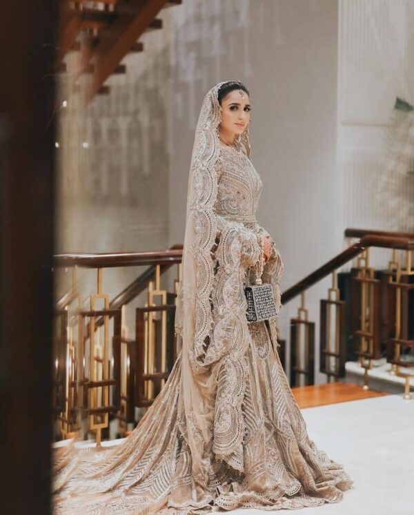 Ivory bridal gown with long trail