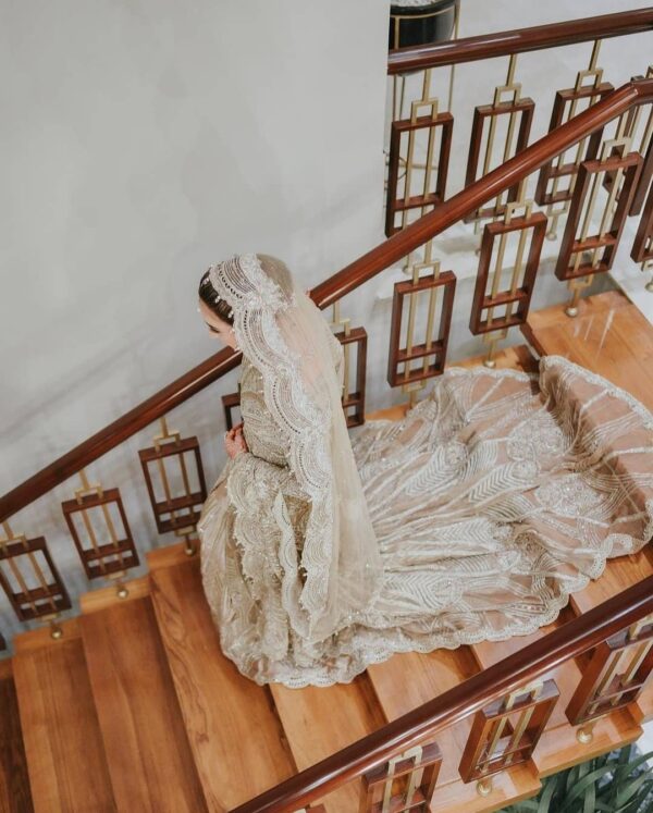 Ivory bridal gown with long trail