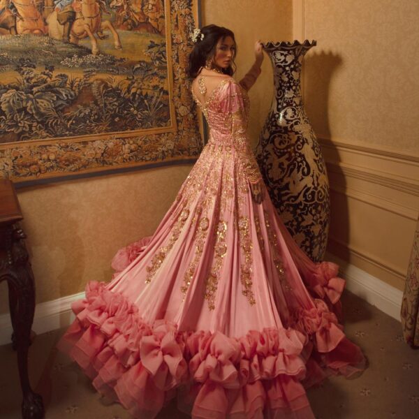 long party wear designer gown with golden embroidery
