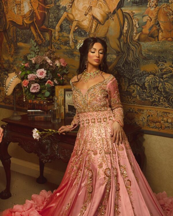 light pink designer gown with golden embroidery