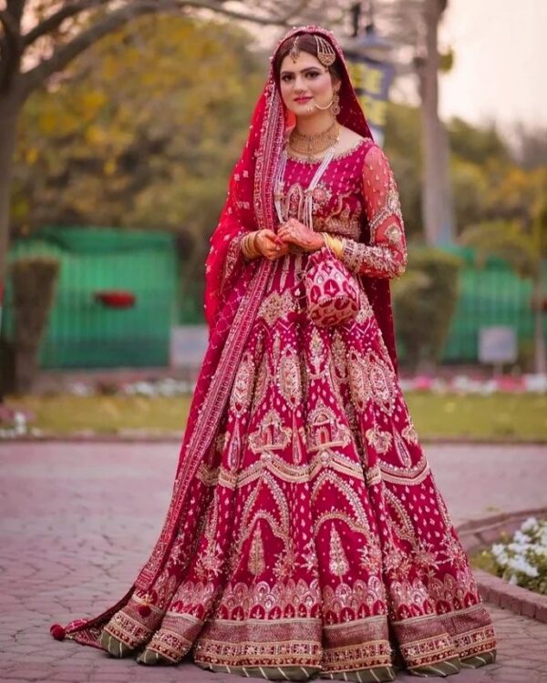 Rani pink wedding gown with golden embroidery