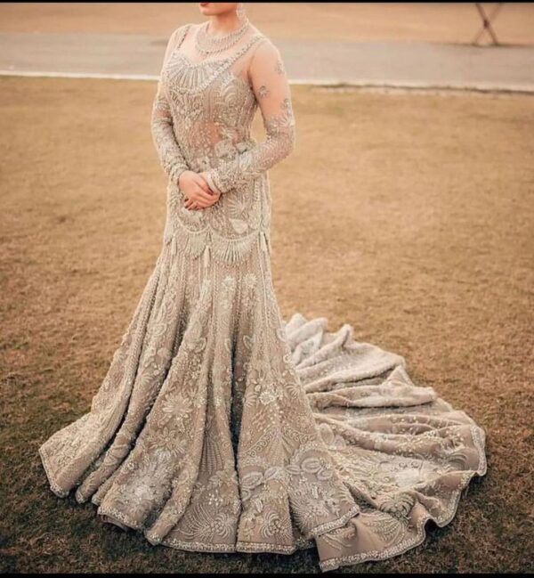 ivory bridal lehenga with golden embroidery