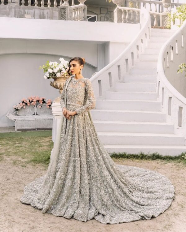 Ivory wedding gown with long trail
