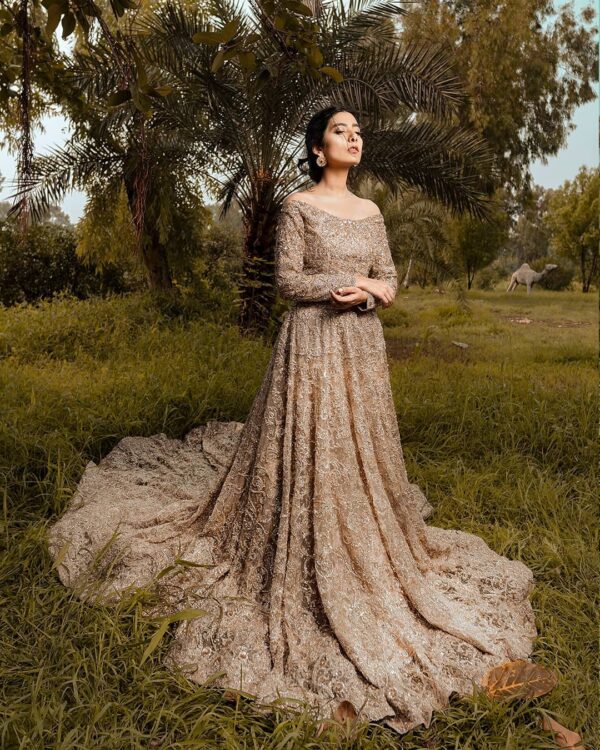 Ivory wedding gown with long trail