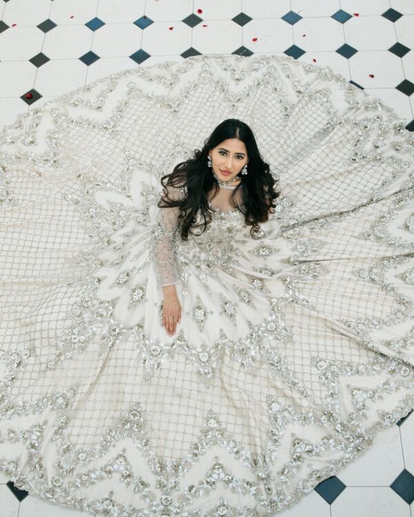 white designer gown with silver embroidery