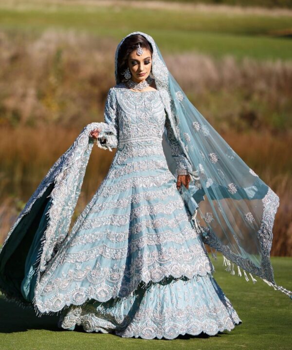 Blue wedding lehenga with long trail