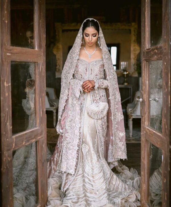 ivory long trail gown with hand work