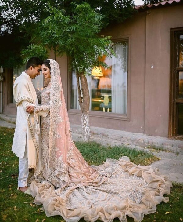 Ivory long trail gown with hand work