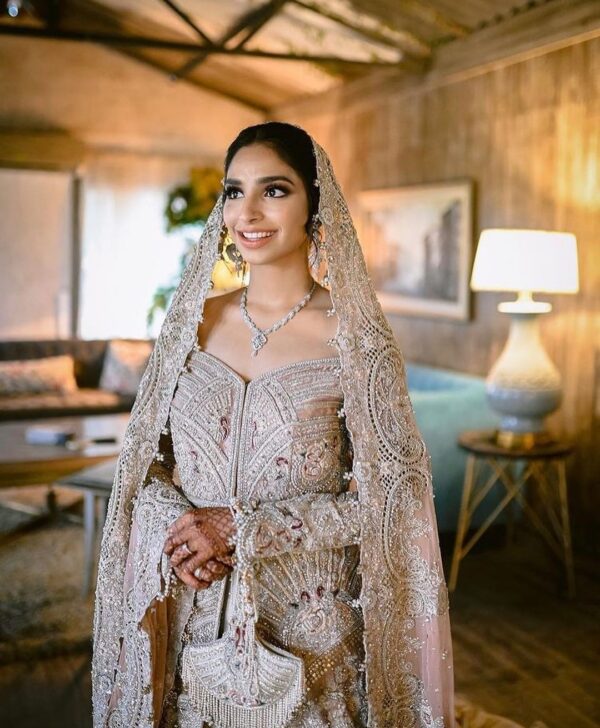 ivory long trail gown with hand work