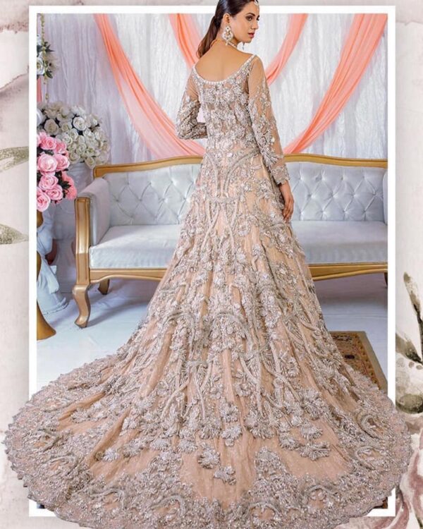 long trail wedding gown with hand work