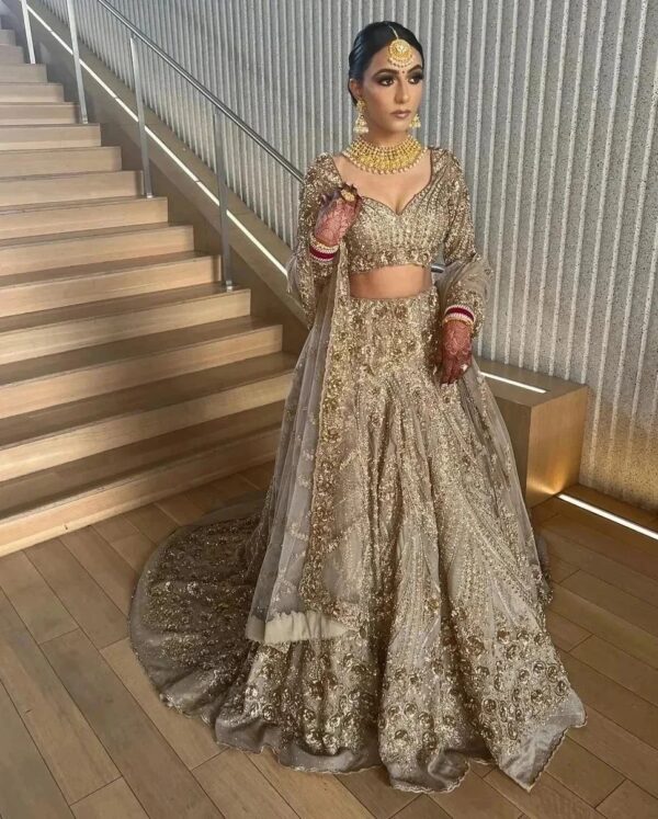 long trail wedding lehenga with hand work