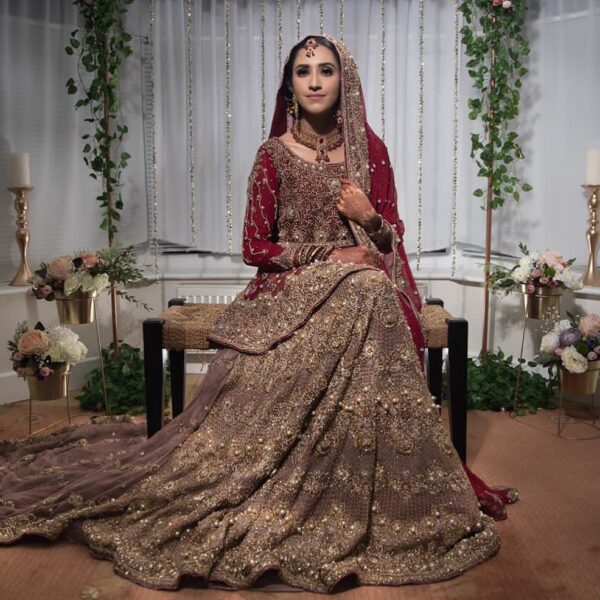 maroon peplum with long trail wedding lehenga