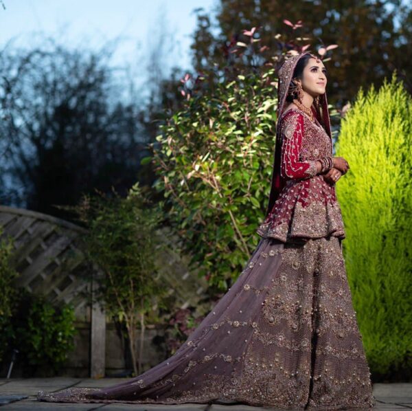 Maroon wedding long trail lehenga with hand work