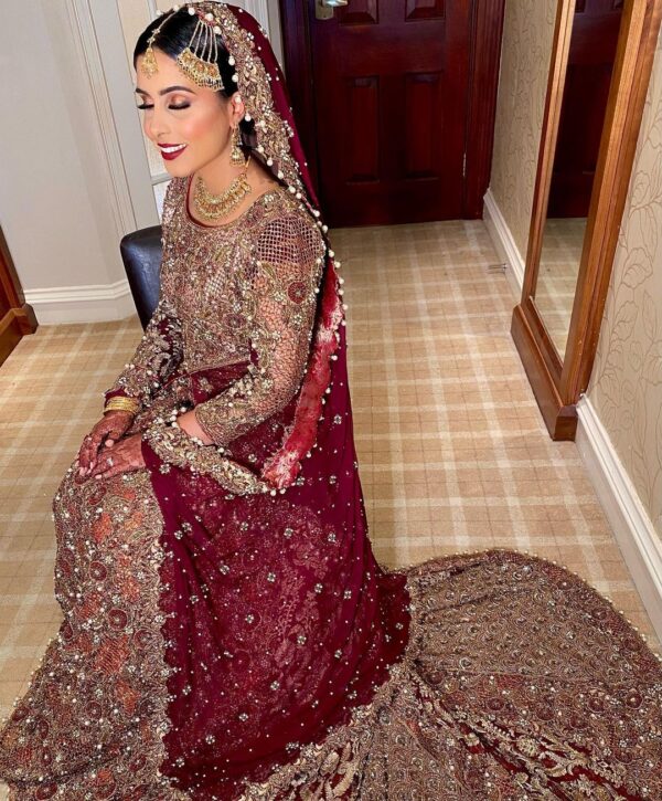 Wedding long trail gown with hand work