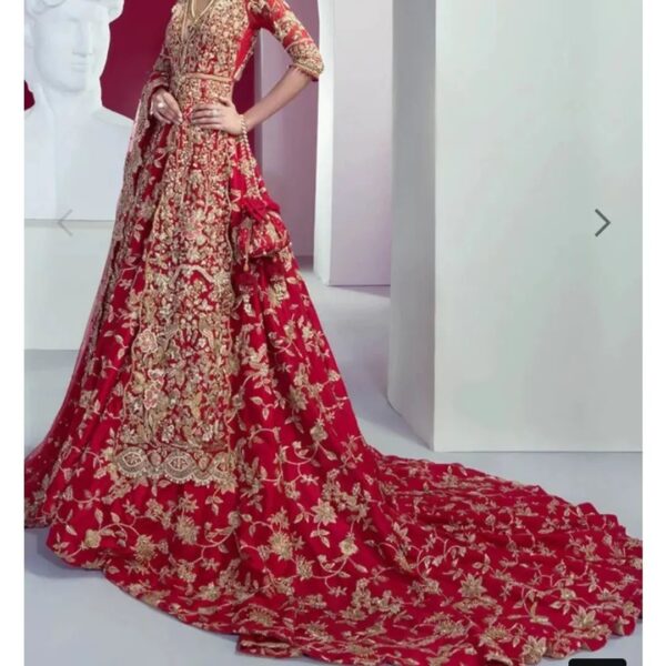 long trail wedding lehenga with hand work