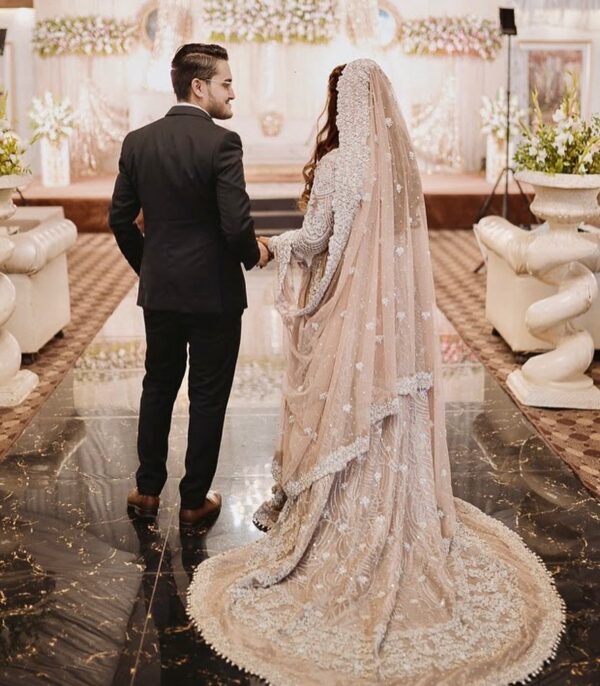 wedding long trail bridal gown with hand work
