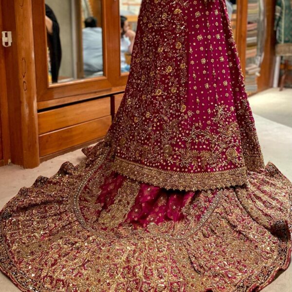 wedding long trail lehenga with golden embroidery