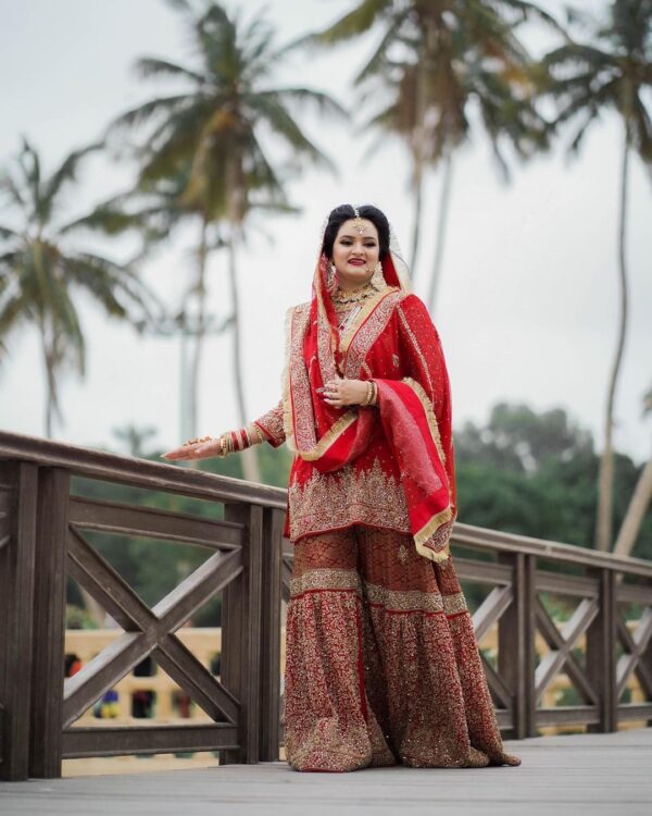 Red bridal garara suit with handwork