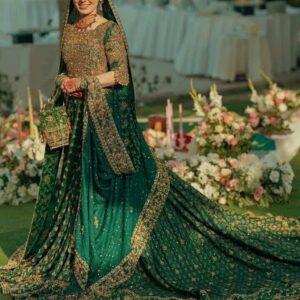 Green designer gown with trail