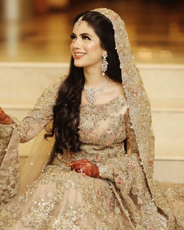 Ivory long trail wedding gown with handwork