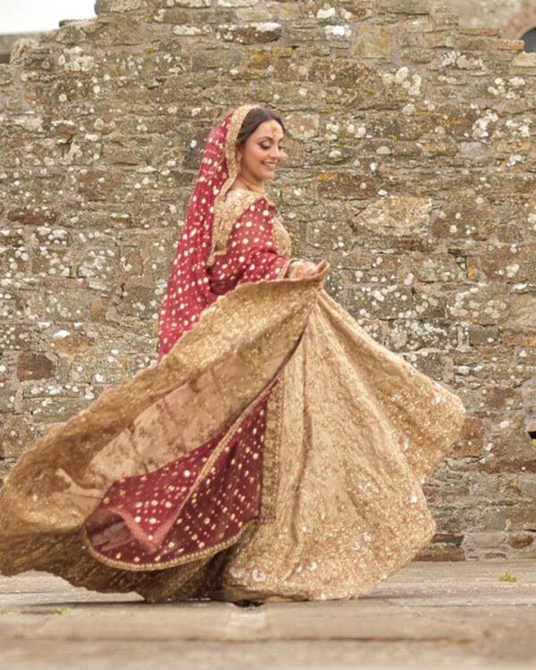 Golden long trail lehenga