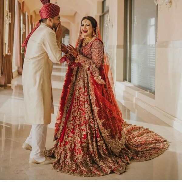 wedding long trail bridal lehenga with hand work
