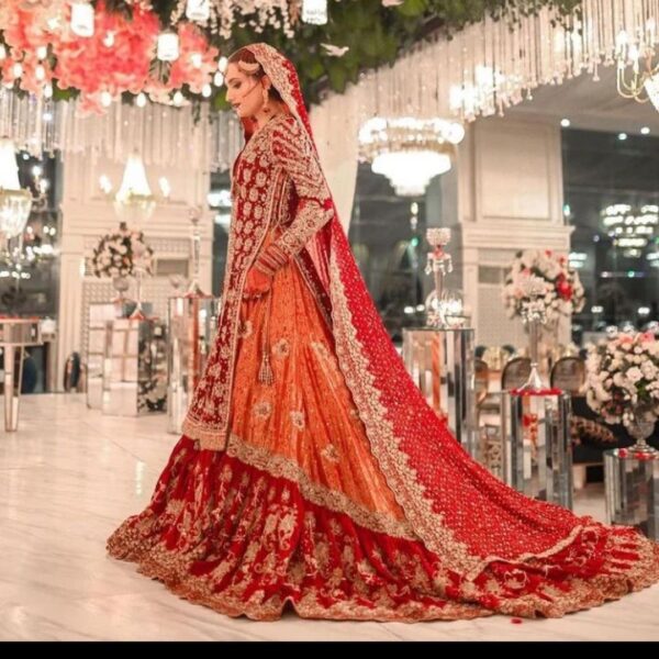 Long trail wedding lehenga with hand work