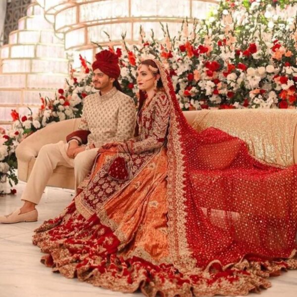 red long trail wedding lehenga
