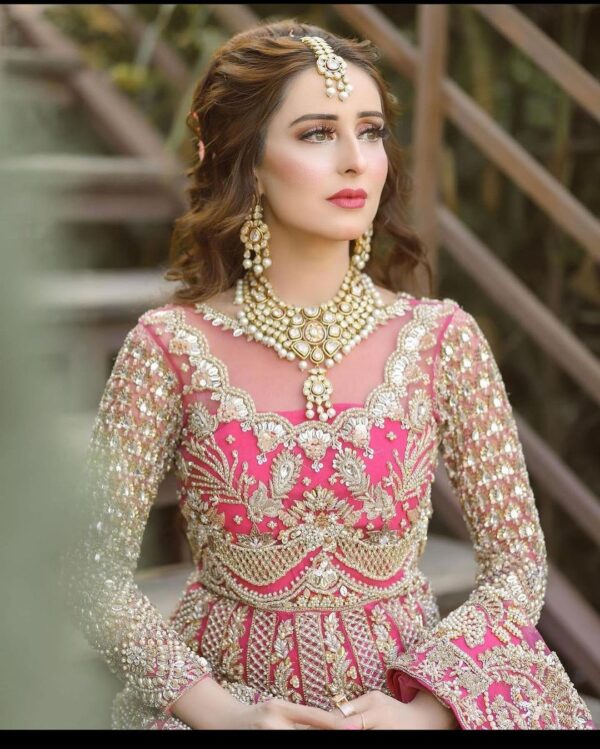 long bridal gown with hand work