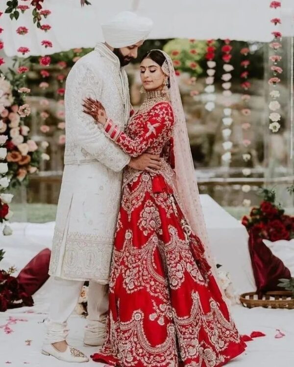 red bridal lehenga choli with handwork