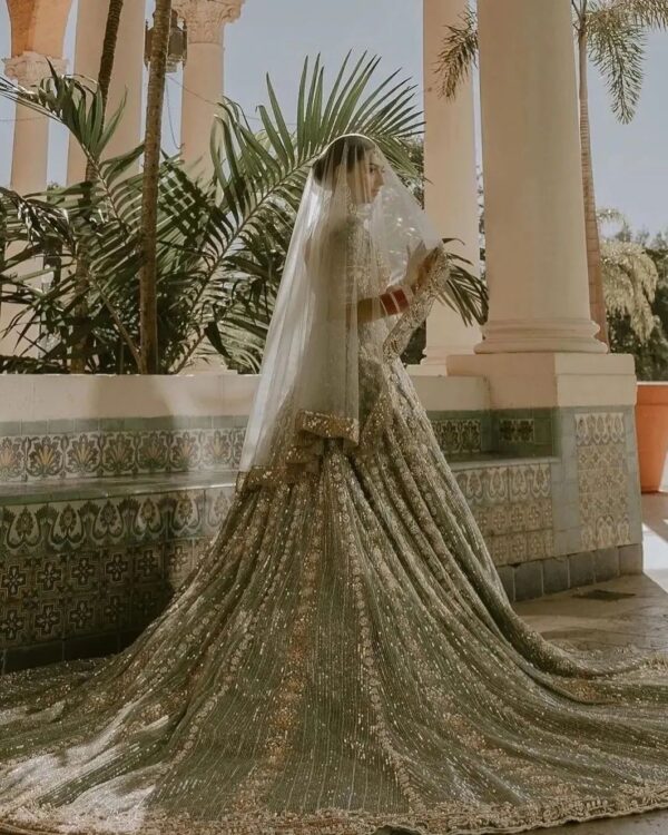 Ivory wedding longtrail lehenga