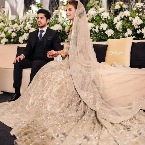 long trail wedding gown with handwork