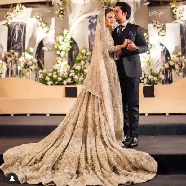 Golden long trail wedding gown with embroidery