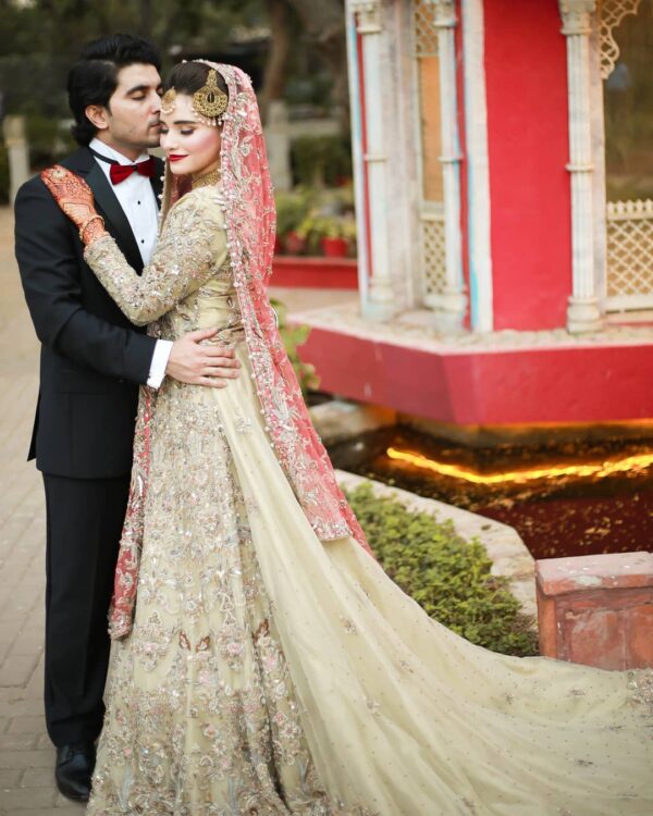 wedding long trail gown with golden embroidery