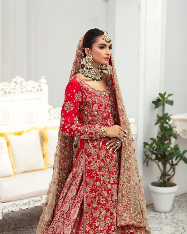 Red Pakistani wedding lehenga with handwork