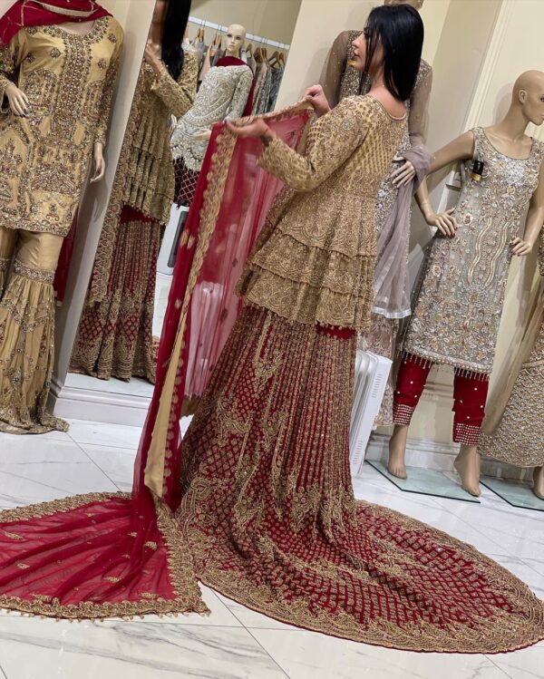 Red long trail lehenga with golden embroidery