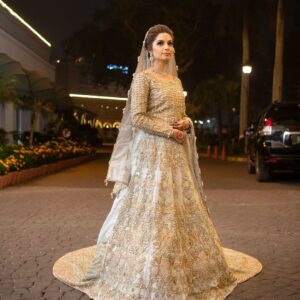 White designer gown with golden embroidery