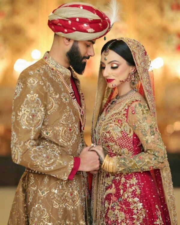 Designer long embroidered kameez with long trail lehenga