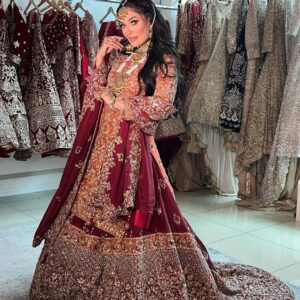 red embroidered kurti with long trail lehenga