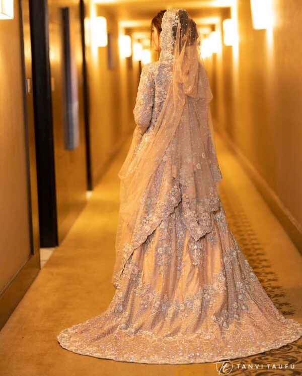 wedding long trail gown with golden embroidery