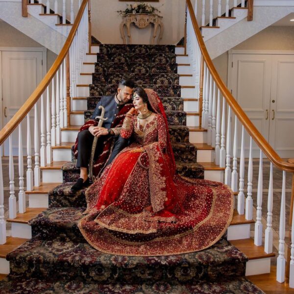 red bridal long trail anarkali with lehenga